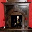 Corner concrete fireplace